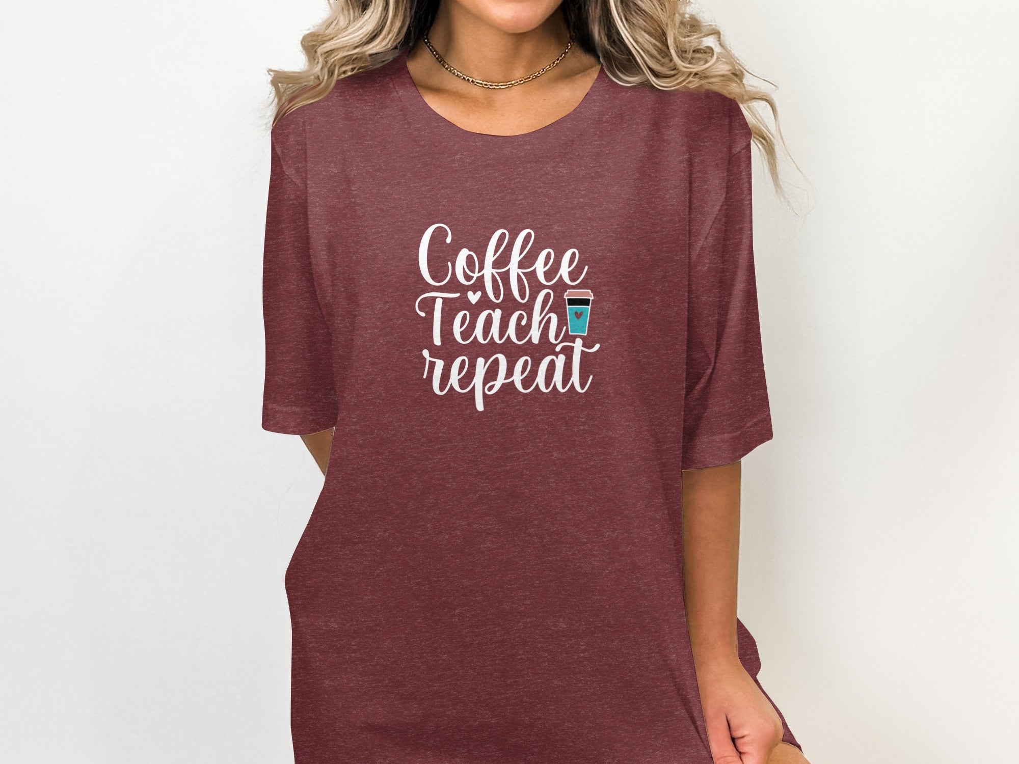 Maroon t-shirt with white text "Coffee Teach repeat" and a coffee cup icon.