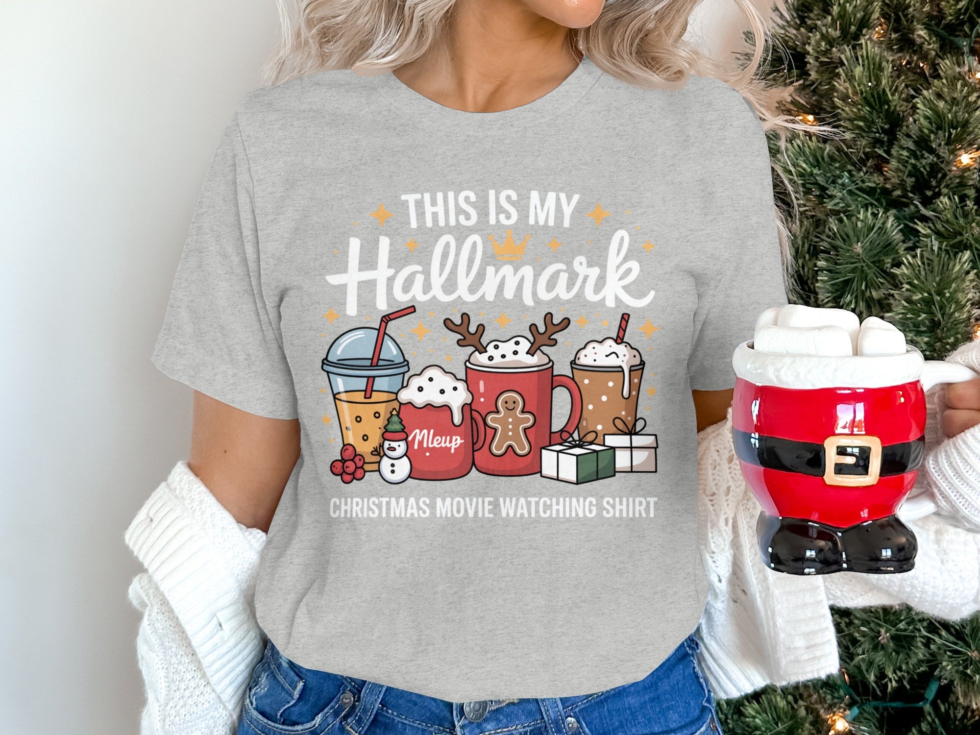 Grey shirt with "This is my Hallmark Christmas Movie Watching Shirt" text and holiday graphics.