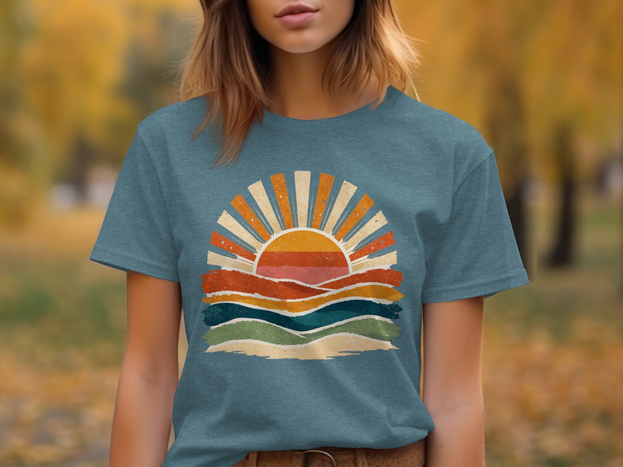 T-shirt with a vintage sunset graphic design featuring colorful wavy layers.
