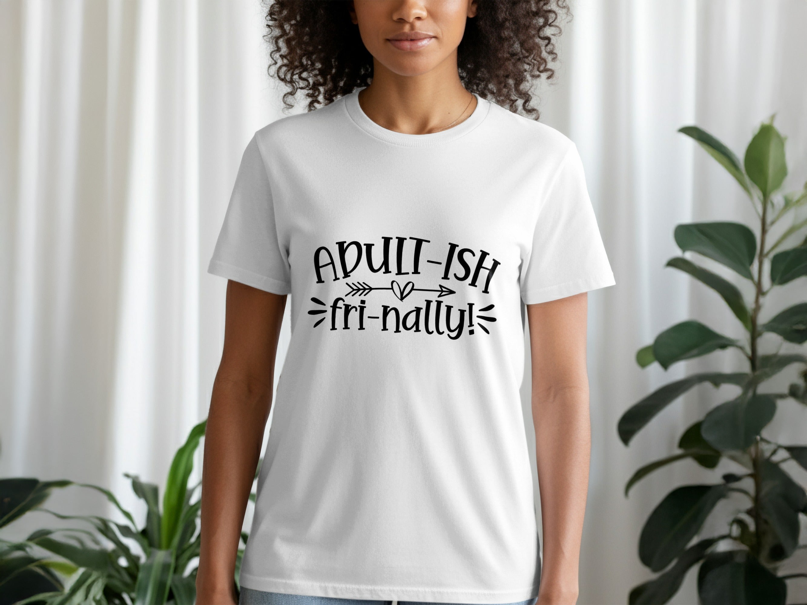 White t-shirt with black text reading "Adult-ish fri-nally!"