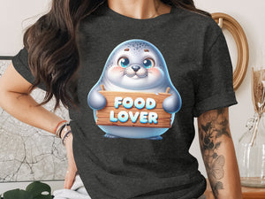 Chubby cartoon seal holding wooden sign with text FOOD LOVER