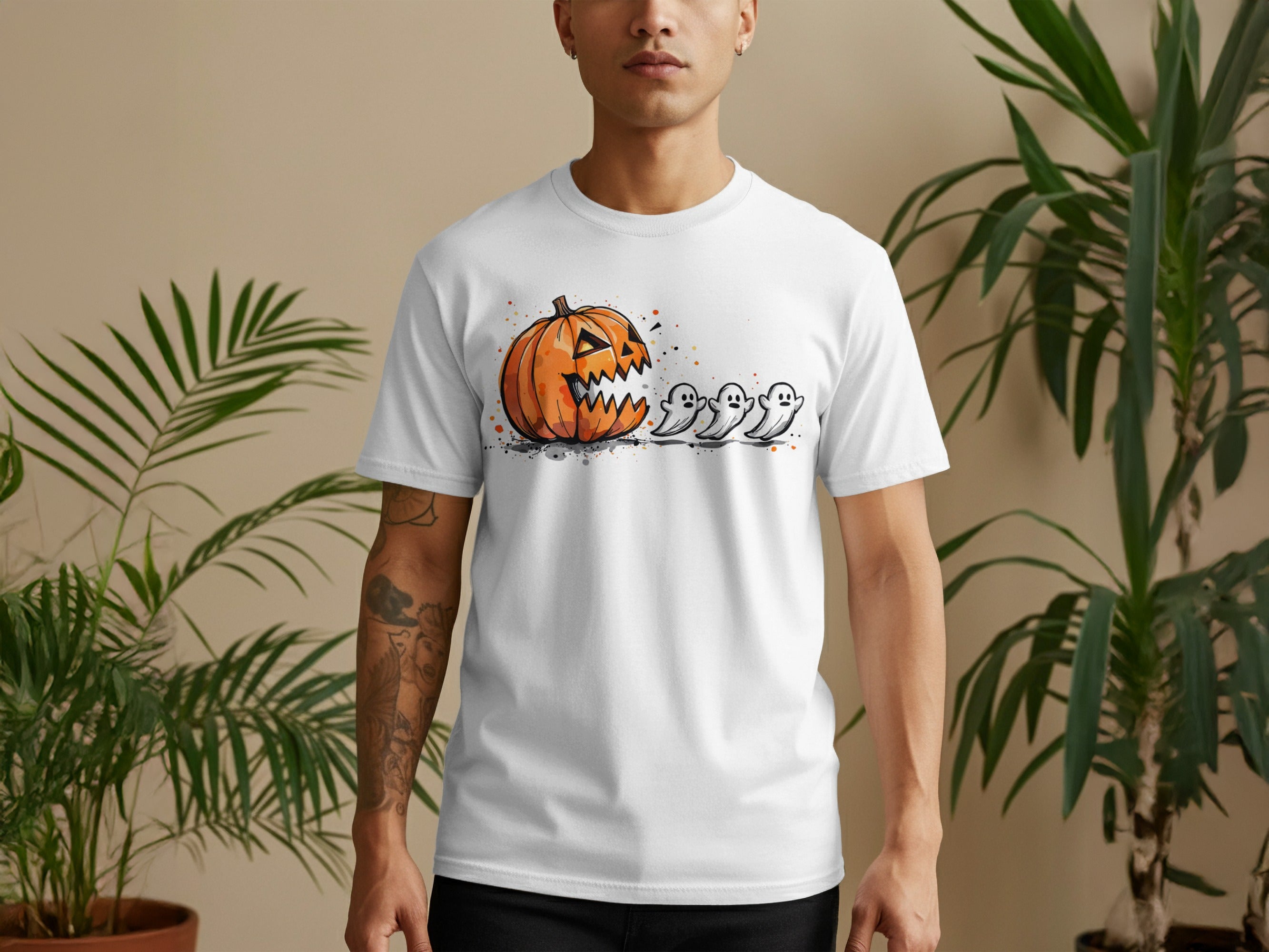 White t-shirt with a Halloween jack-o-lantern and three cartoon ghosts design.
