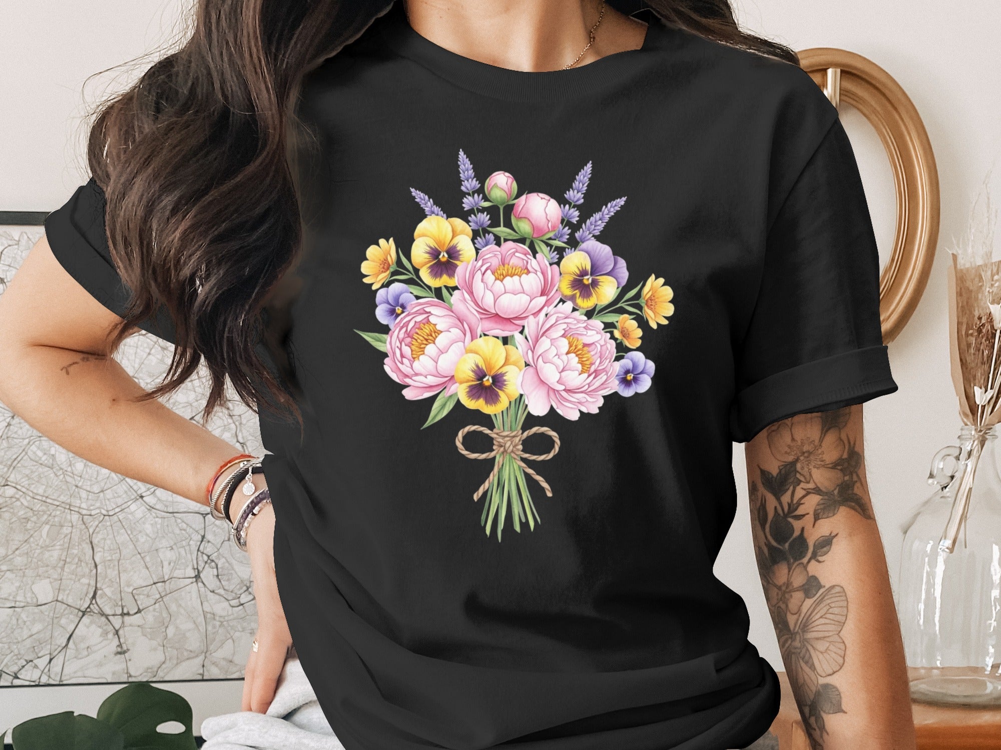 Black t-shirt with watercolor floral bouquet design and twine bow.