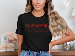 Black t-shirt with red text "I'M DREAMING OF A White Christmas" and snowflakes.
