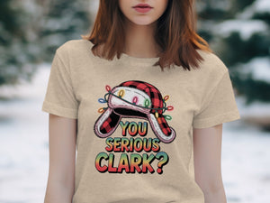 T-shirt with a graphic of a checkered hat with Christmas lights and text "YOU SERIOUS CLARK?"