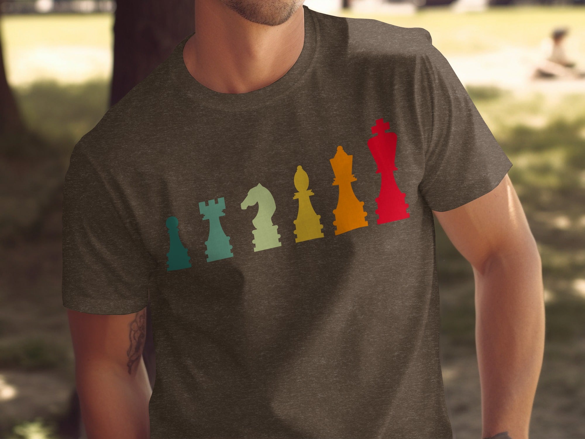 Chocolat-colored t-shirt with a retro-style chess piece silhouette graphic.
