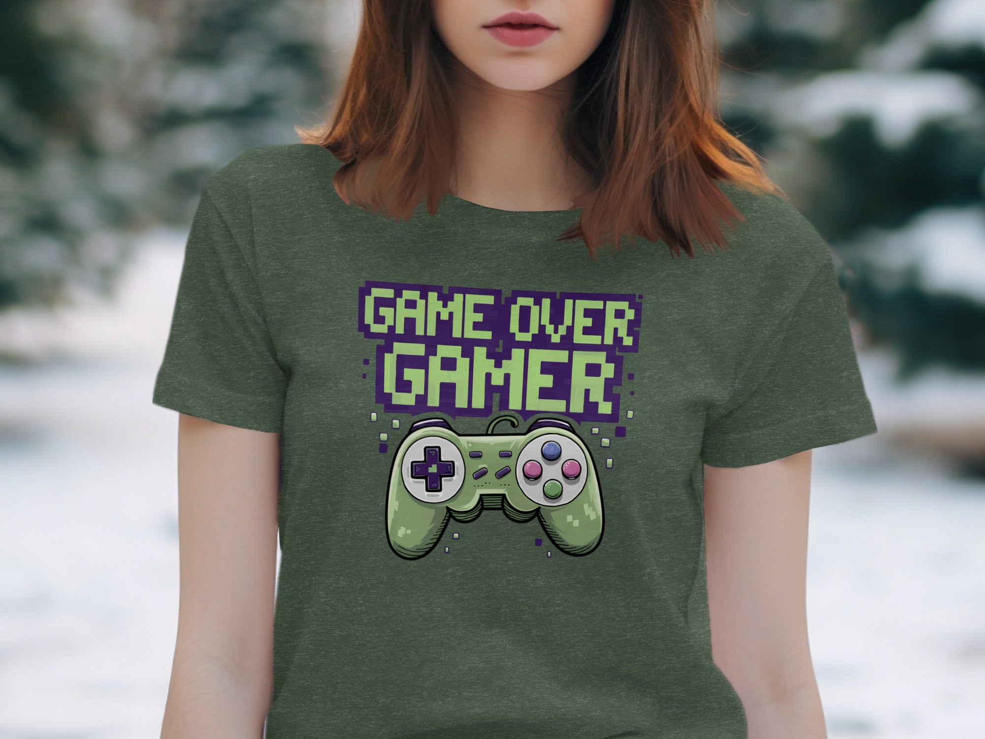 Green t-shirt with "Game Over Gamer" text and pixelated video game controller.