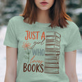 Light green t-shirt with stacked books graphic and text: "JUST A girl WHO loves BOOKS".