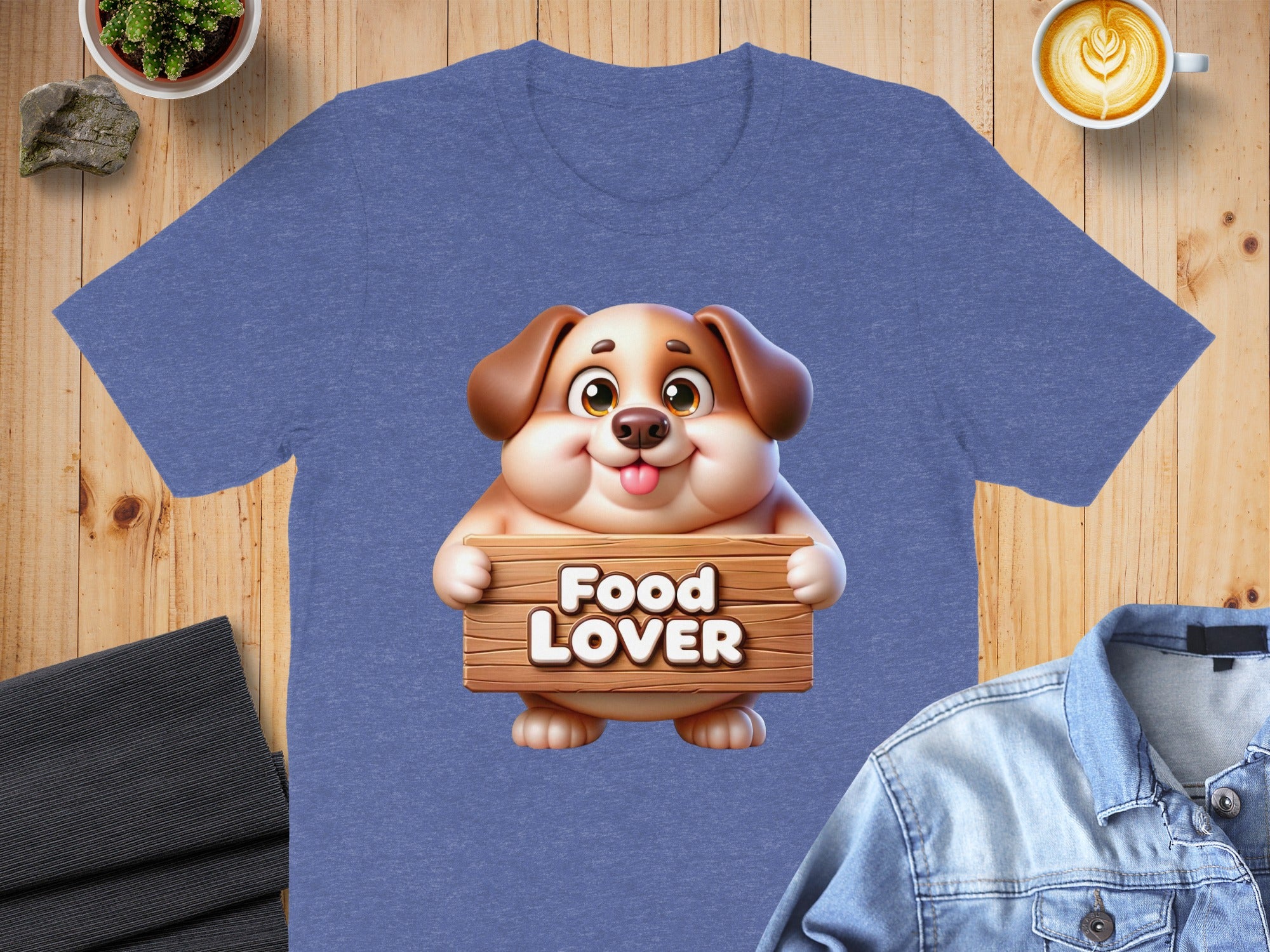 Blue t-shirt with cartoon dog holding a "Food Lover" sign.