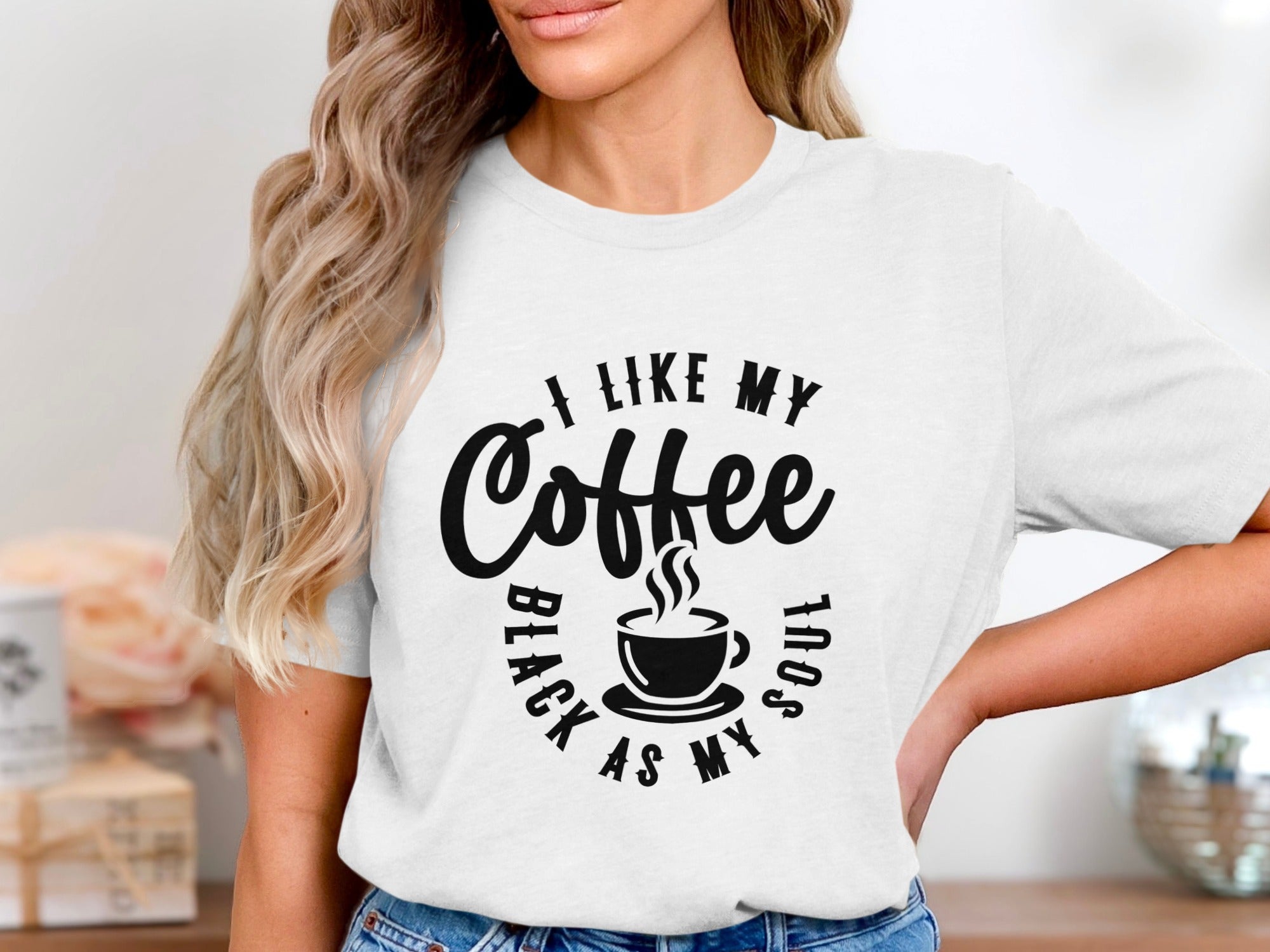 White t-shirt with "I like my coffee black as my soul" text design.