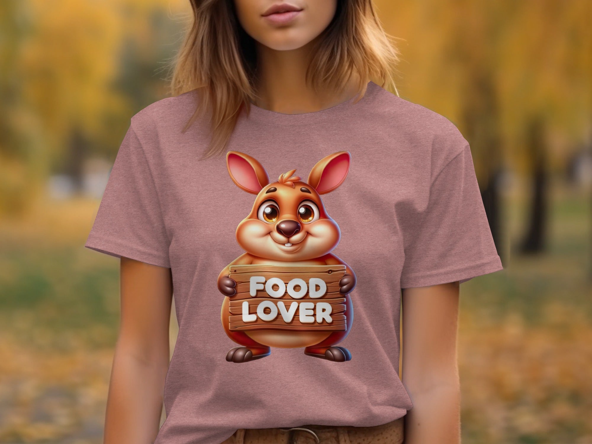 Cartoon groundhog on pink t-shirt holds wooden sign reading "FOOD LOVER"