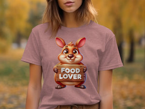 Cartoon groundhog on pink t-shirt holds wooden sign reading "FOOD LOVER"