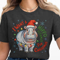 Hippo wearing Santa hat and Christmas lights, text "I want a hippopotamus for Christmas."