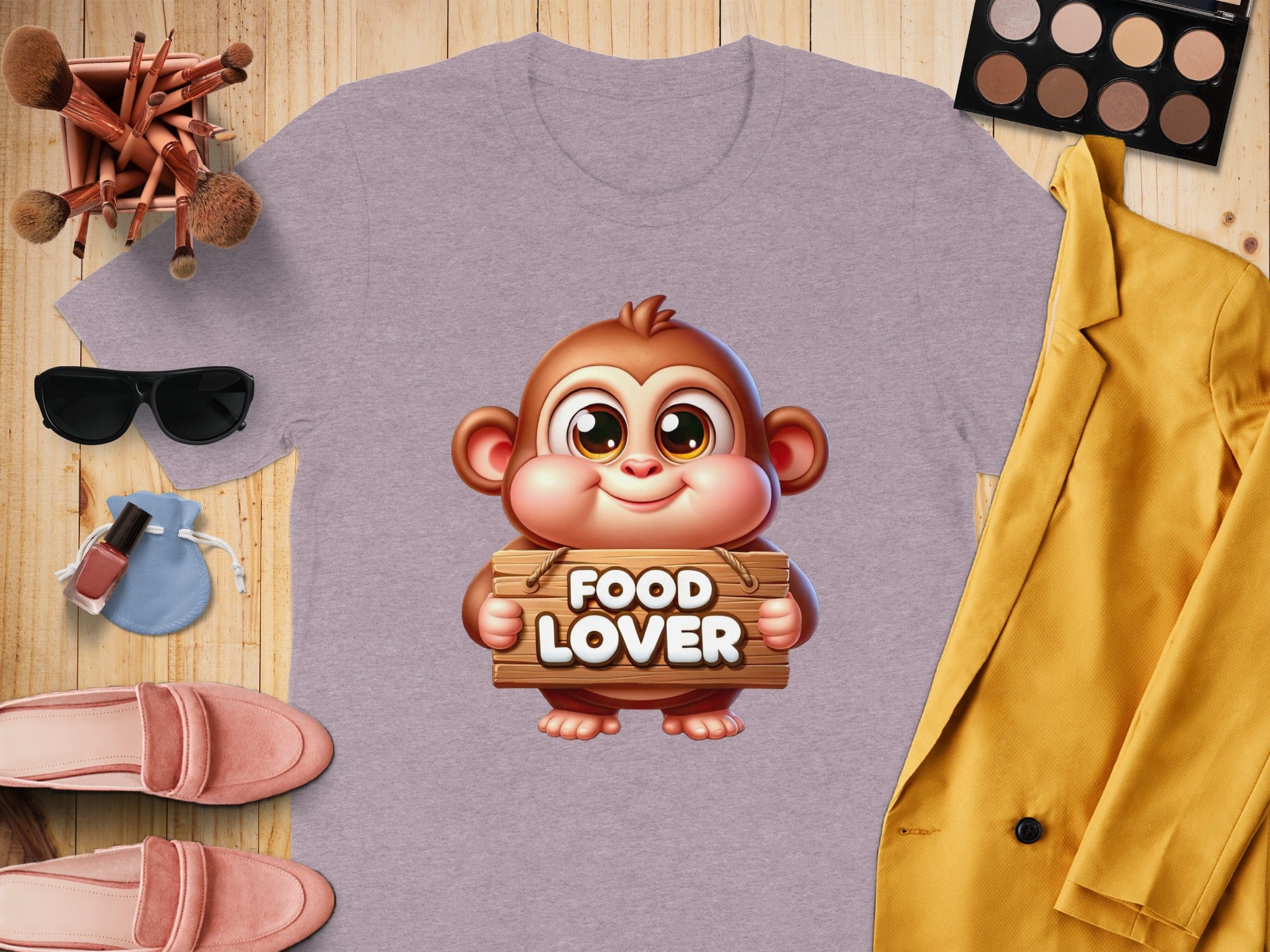 Purple t-shirt with a cartoon monkey holding a wooden sign that says "FOOD LOVER".