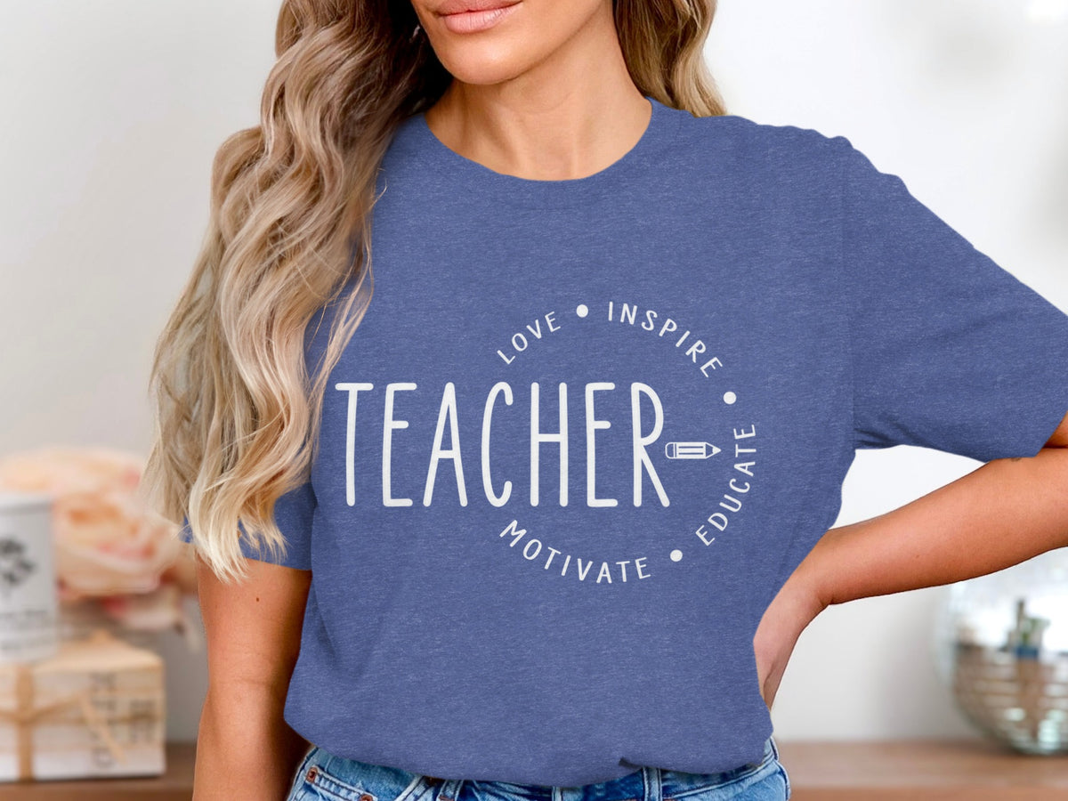 Blue t-shirt with white text "TEACHER" and words love, inspire, motivate, educate.