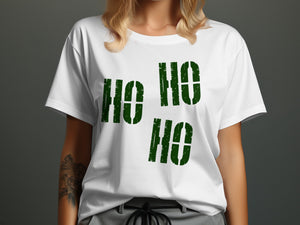 White t-shirt with distressed green "Ho Ho Ho" text on chest.