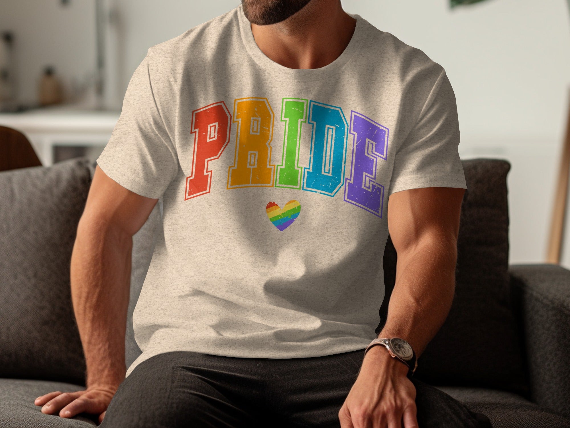 T-shirt with rainbow-colored "PRIDE" text and a small rainbow heart.