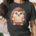 Cute hedgehog graphic with "FOOD LOVER" text on a dark t-shirt.