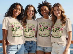 Four women wear tan t-shirts with a floral gardening graphic and text.