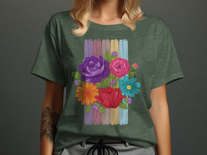 Green t-shirt with colorful floral bouquet illustration and vertical stripe background.
