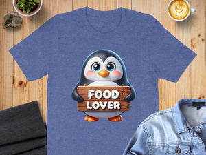 Blue t-shirt with cartoon penguin holding "FOOD LOVER" sign.