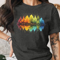 Dark grey t-shirt with a rainbow forest and reflection graphic.