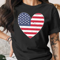 Black t-shirt with distressed American flag heart graphic.