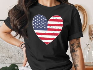 Black t-shirt with distressed American flag heart graphic.