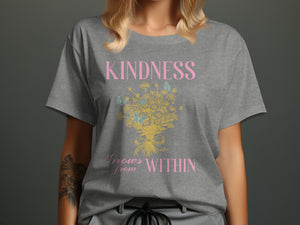 Grey t-shirt with pink text "KINDNESS Grows from WITHIN" and a floral design.