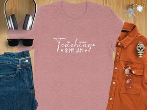 Rose t-shirt with "Teaching is my Jam" graphic, surrounded by accessories.