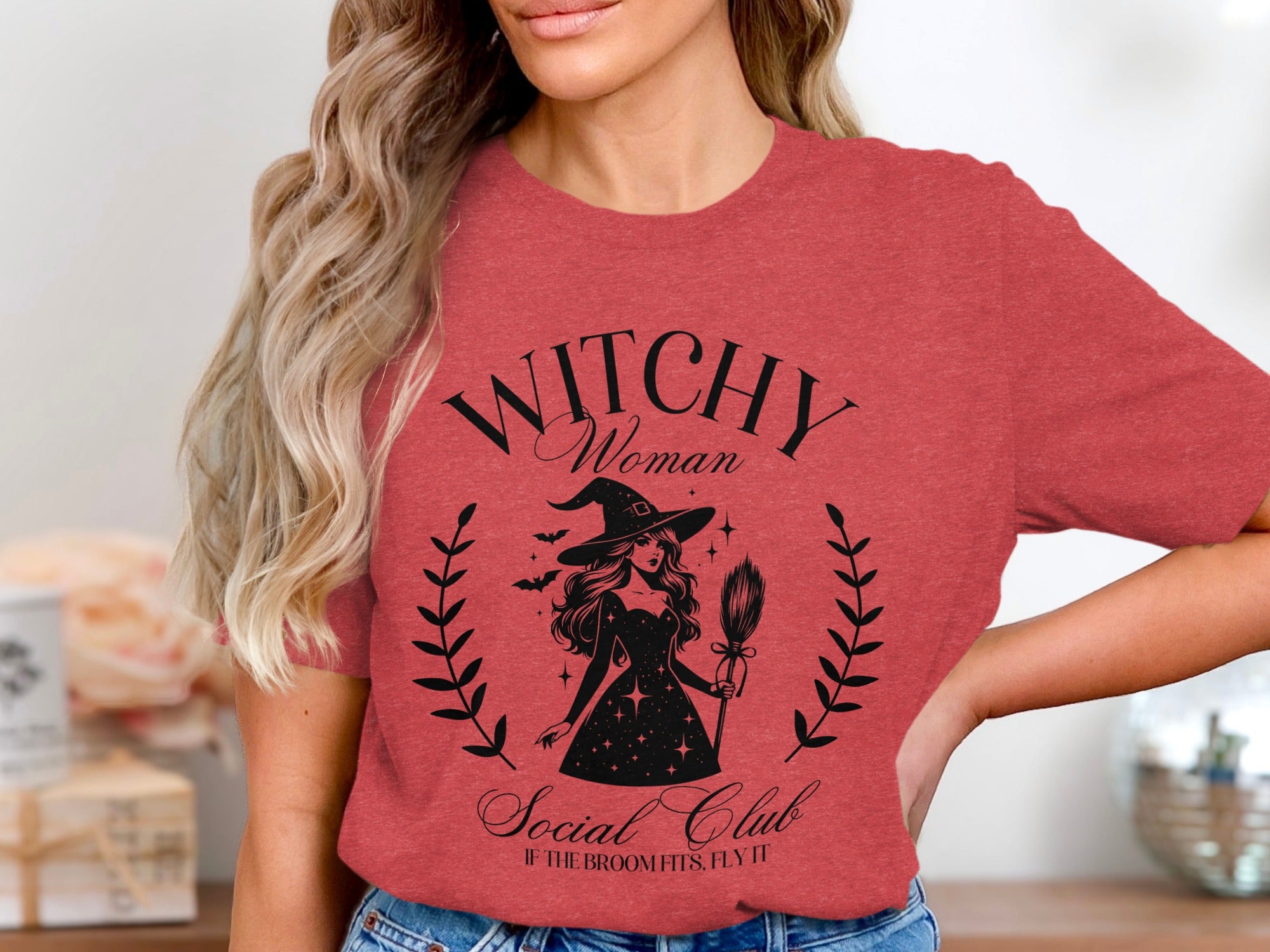 "Witchy Woman Social Club" graphic with a witch illustration and the text "If the broom fits, fly it".