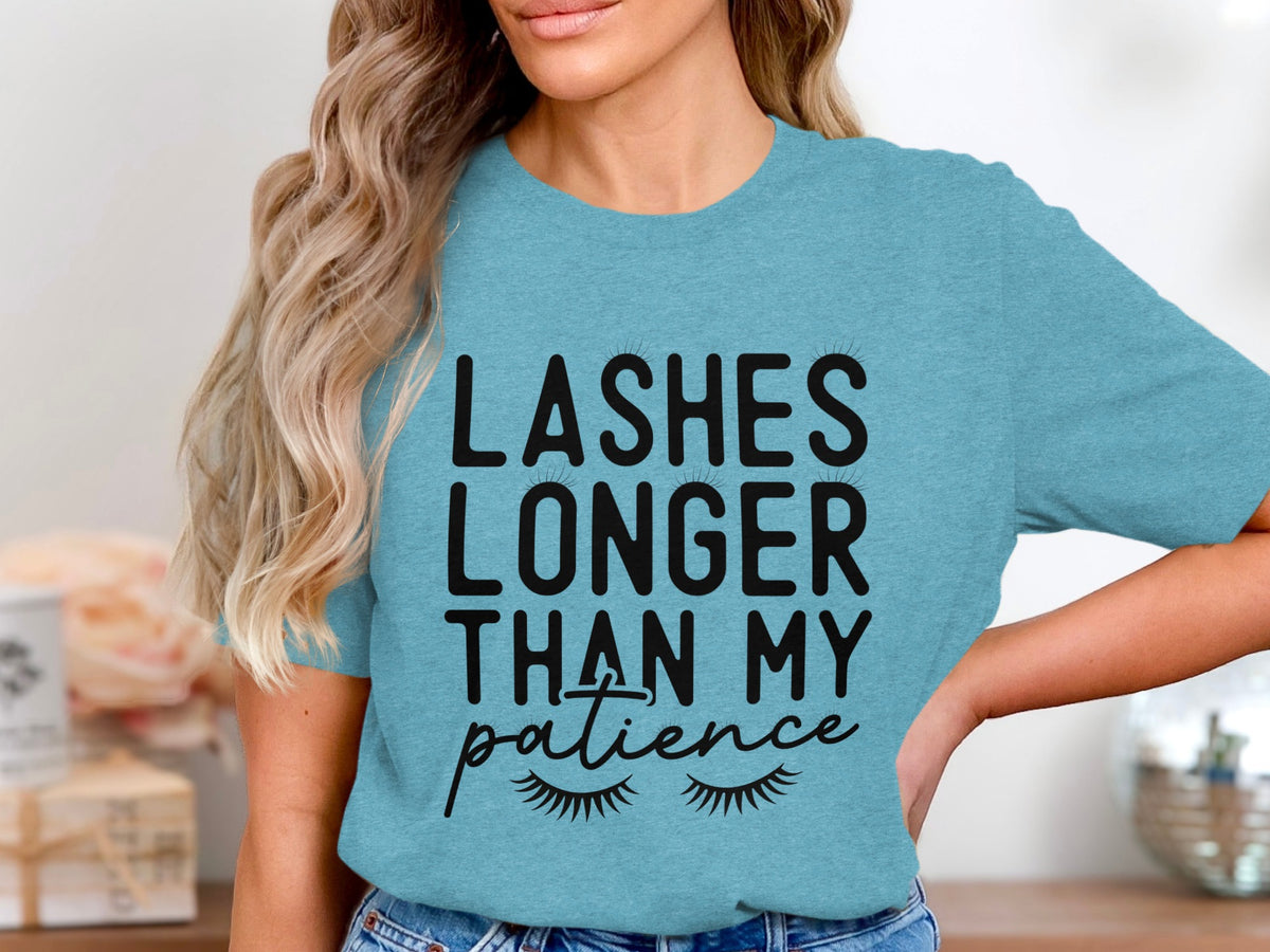 Teal t-shirt with black text "LASHES LONGER THAN MY patience" and eyelash graphics.