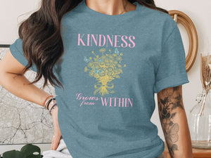 Teal t-shirt with "KINDNESS Grows from WITHIN" and a floral bouquet with butterflies design.