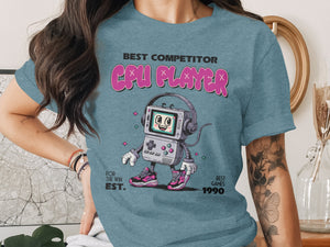 T-shirt graphic: Best Competitor CPU Player, retro gaming console character, "For the Win Est. Best Games 1990".