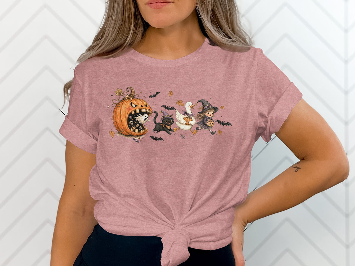 Halloween t-shirt with a cartoon pumpkin, black cat, duck, and witch.