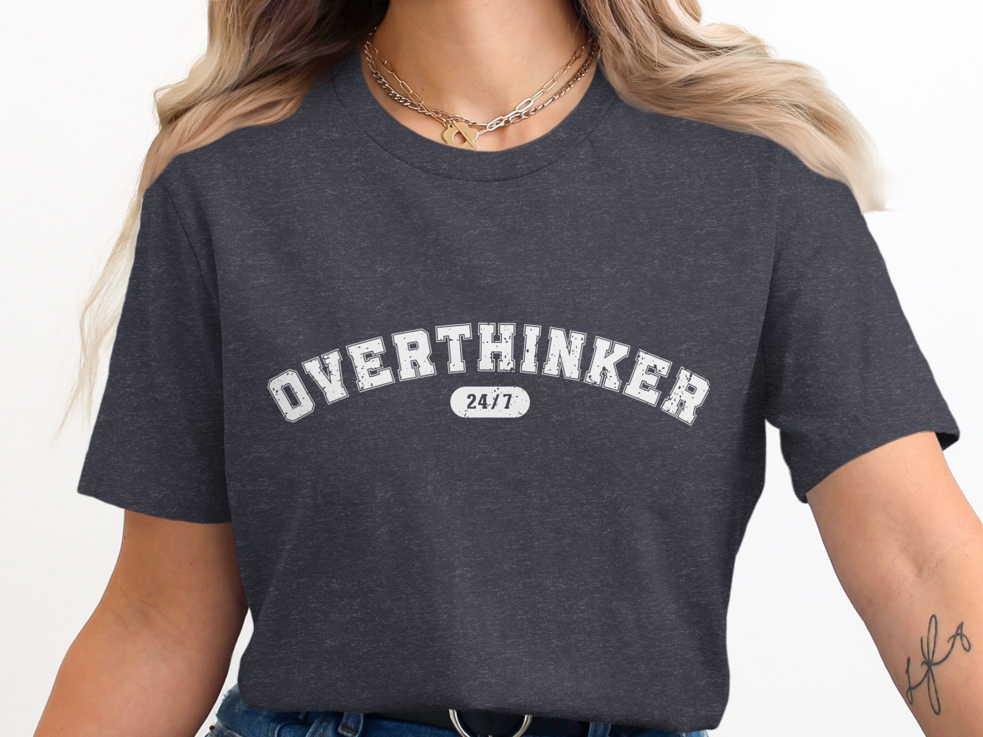 Dark gray t-shirt with "OVERTHINKER 24/7" text in white distressed lettering.