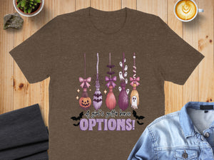 Brown t-shirt with a Halloween graphic of brooms and ghosts text "OPTIONS!".