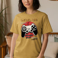 T-shirt with "Level Up! Never Quit. Press Start" and video game controller graphic.