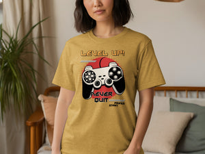 T-shirt with "Level Up! Never Quit. Press Start" and video game controller graphic.