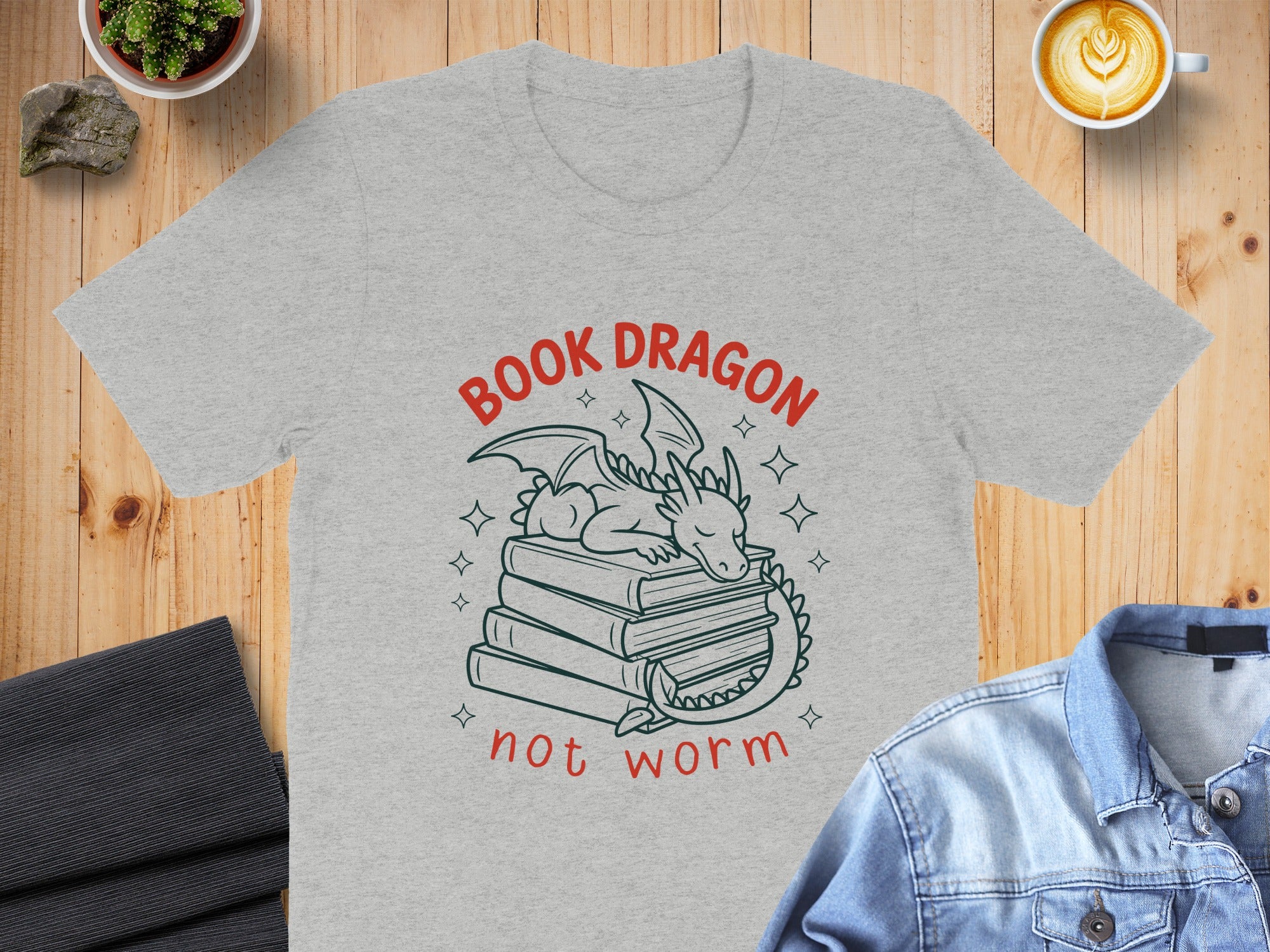 Grey t-shirt with a dragon sleeping on books, "Book Dragon" and "not worm" text.