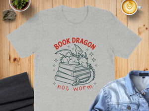 Grey t-shirt with a dragon sleeping on books, "Book Dragon" and "not worm" text.
