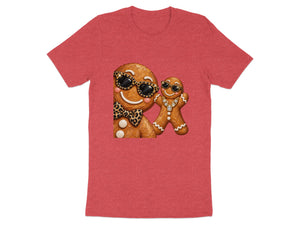 Gingerbread man and child wearing sunglasses and jewelry on red shirt.