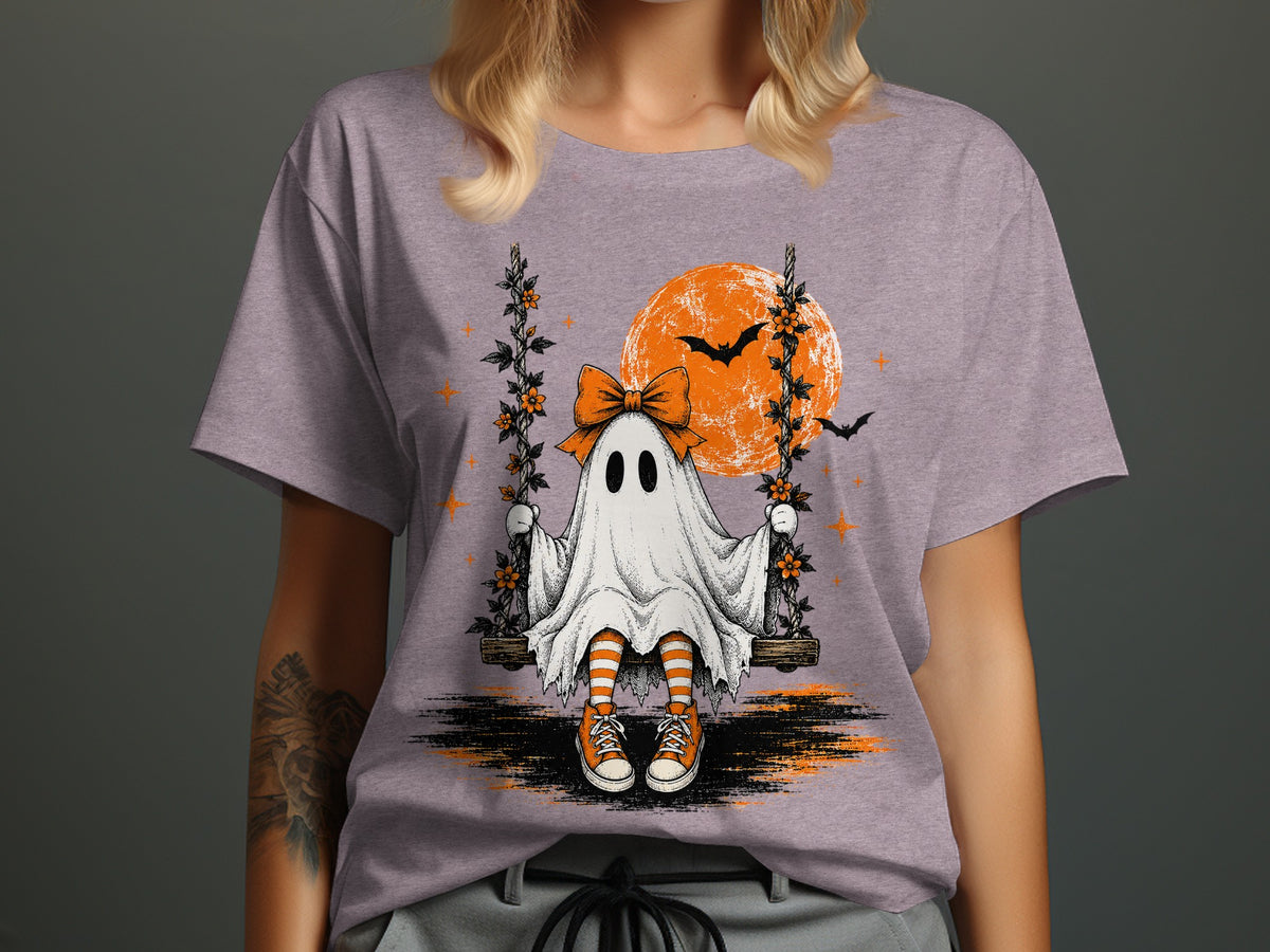 Ghost on swing with orange moon and bats, wearing striped socks and sneakers.