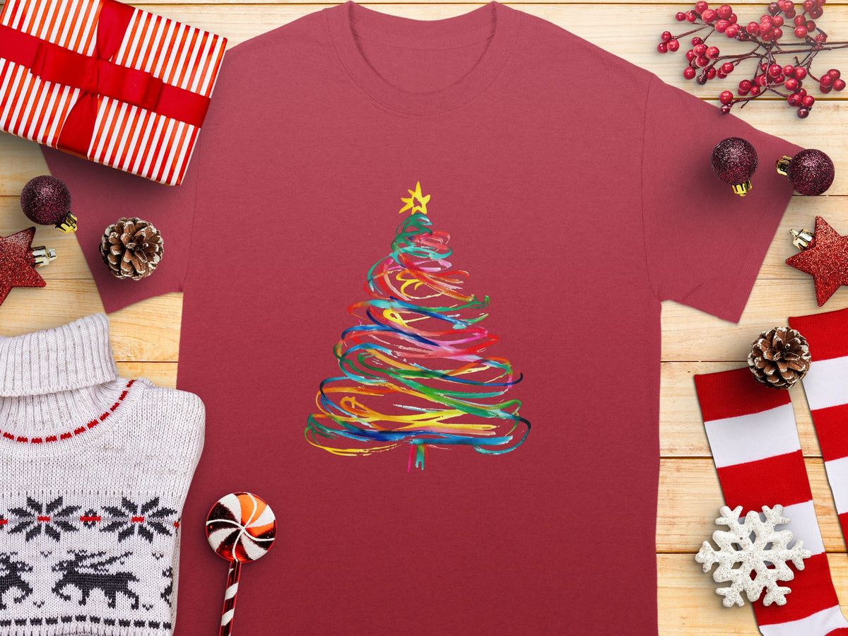 Red t-shirt with a colorful abstract Christmas tree design and star.