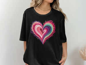 Black t-shirt with a colorful abstract heart design featuring gold accents