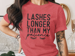 Red t-shirt with black text "LASHES LONGER THAN MY patience" and eyelash graphics.