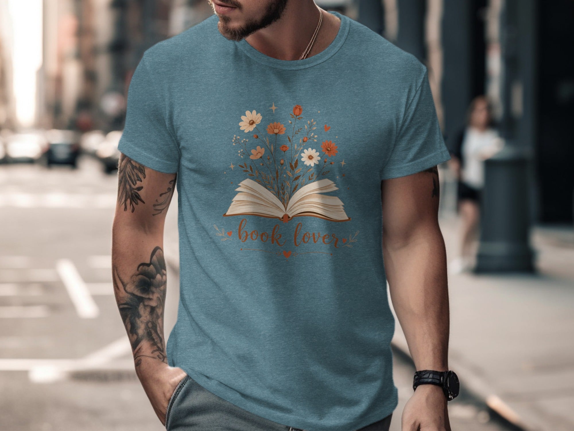 T-shirt with open book graphic, floral design, and "book lover" text.