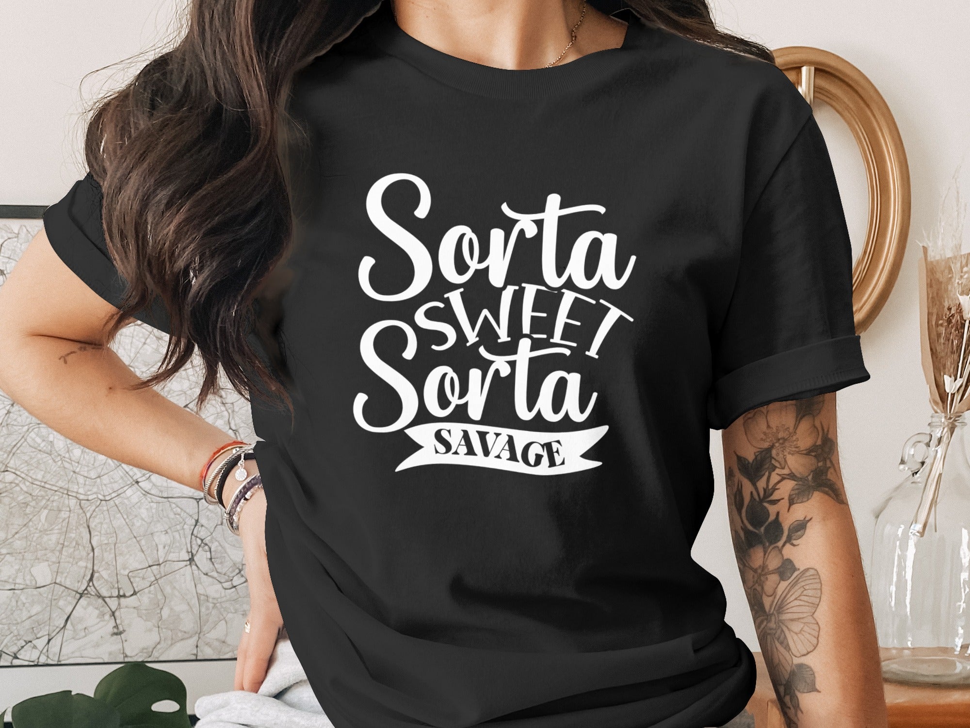 Black t-shirt with "Sorta SWEET Sorta SAVAGE" graphic design.