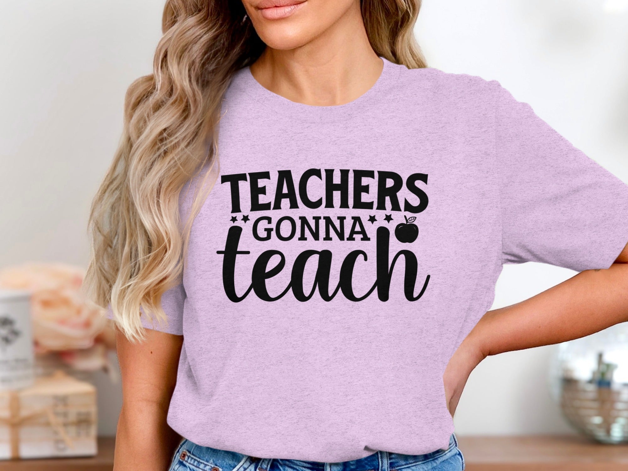Light purple t-shirt with "TEACHERS GONNA teach" and apple graphic.
