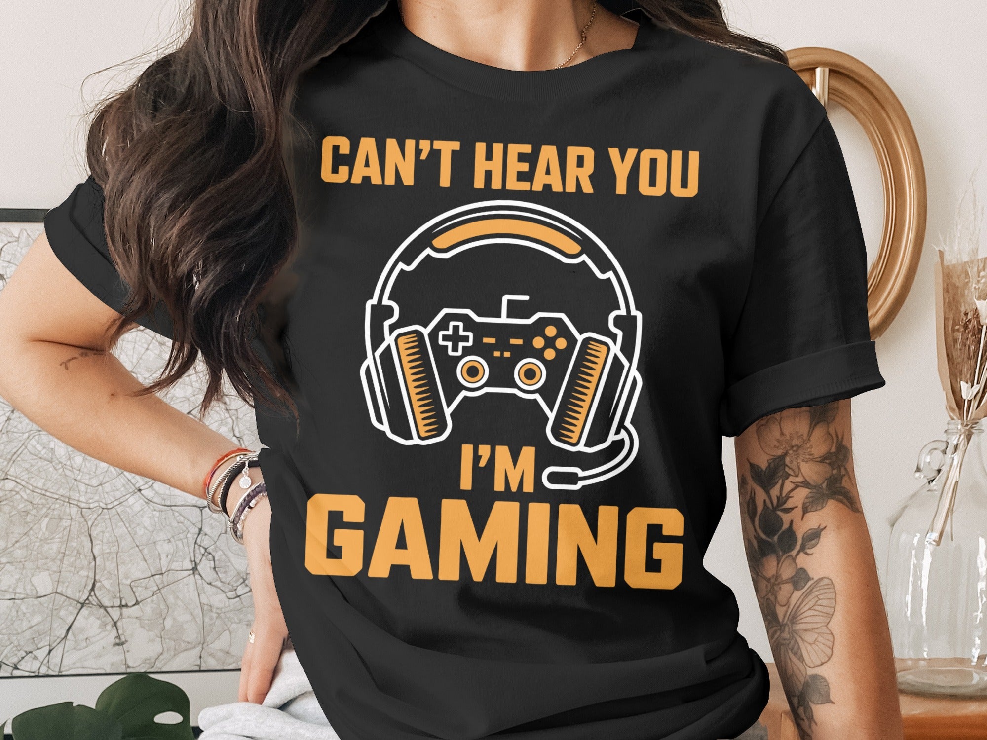 Black t-shirt with "Can't Hear You I'm Gaming" text and gaming controller graphic.